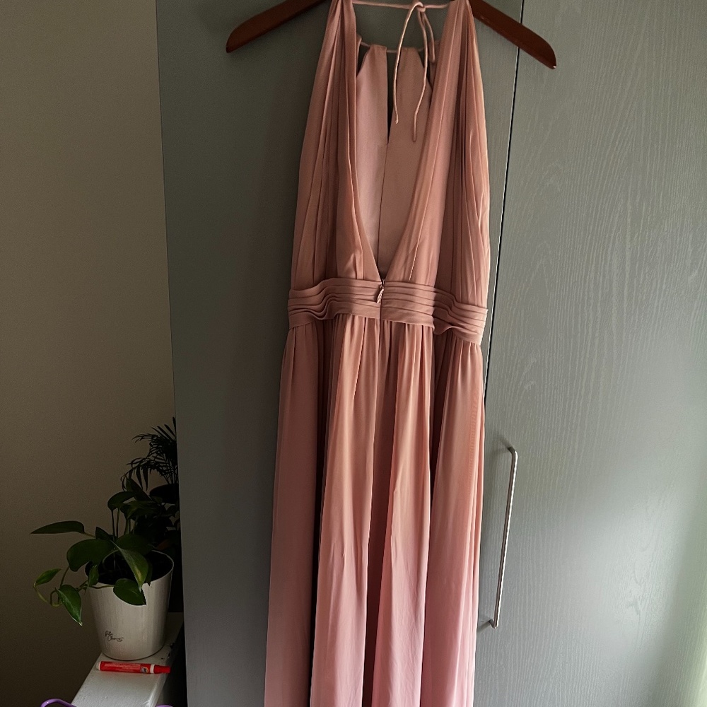 Blush pink sleeveless with a slit dress